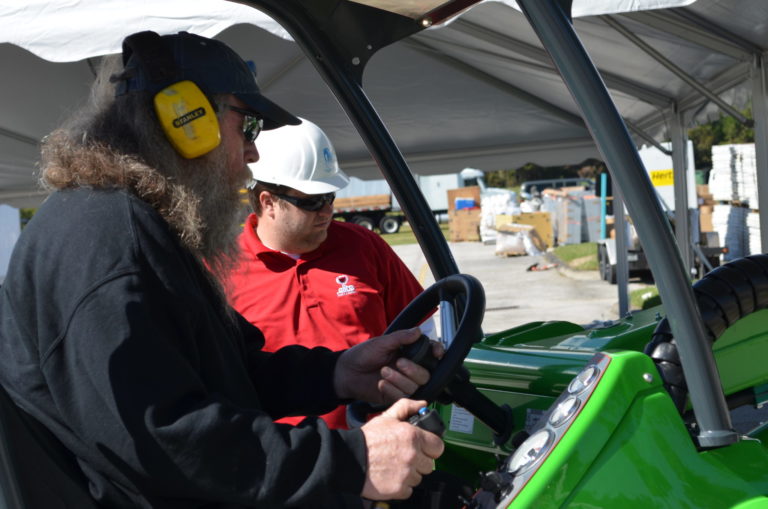 Pete takes over instruction on the OX Driver with Brandon Ahlgren of Elite Events of FL looking on.