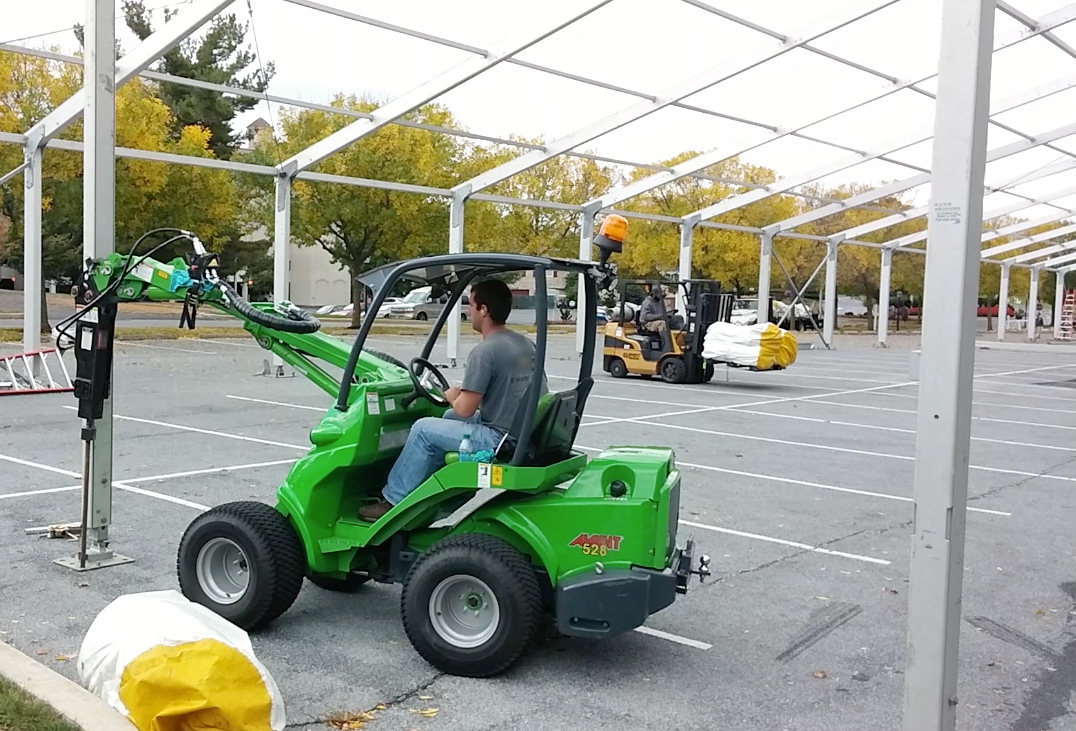 Temporary Shelter tent stake driving by OX Tent OX™