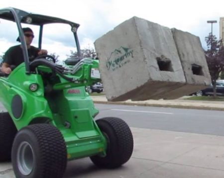 Carrying concrete ballast and other materials from truck to tent site is much easier when it's properly mechanized. For example, this TENT OX machine with its special Block and Roll forks eliminates hand carries and moves at speeds up to 12 mph!