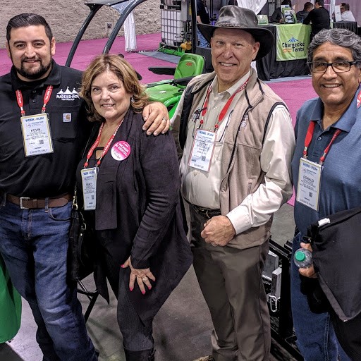 The Vasquez family, owners of Made in the Shade of Sacramento (shown w/ Tent OX's Scott Woodruff, second from right) own 500 and 700 Series machines.